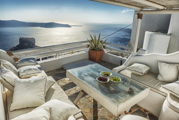 Traditional Greek Cafeteria with View of Volcano and Santorini iStock_000068076721_Large