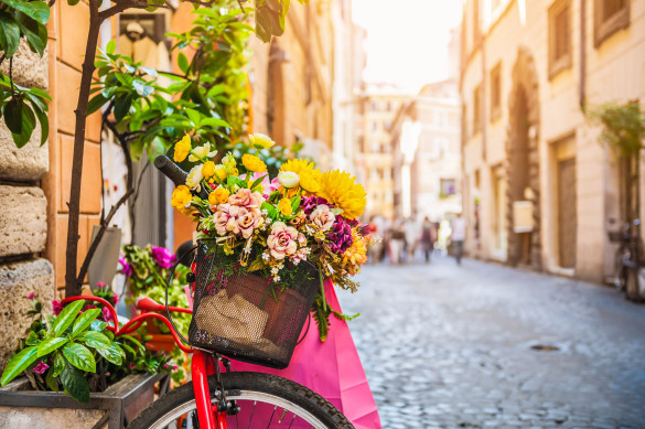 Bicycle with flowers in the old street in Rome, Italy shutterstock_440221486-2