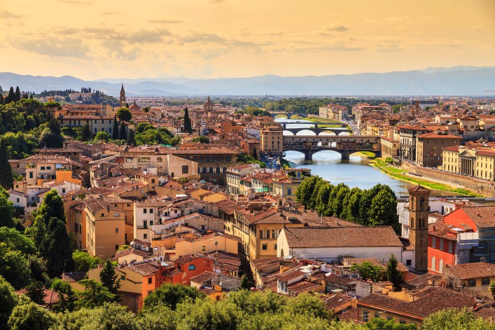Beautiful cityscape skyline of Firenze (Florence), Italy, with the bridges over the river Arno shutterstock_445227091