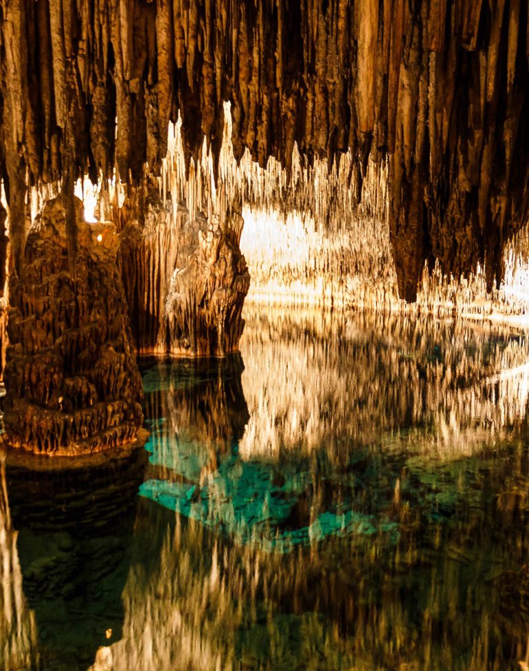 Caves of Drach with reflection in water